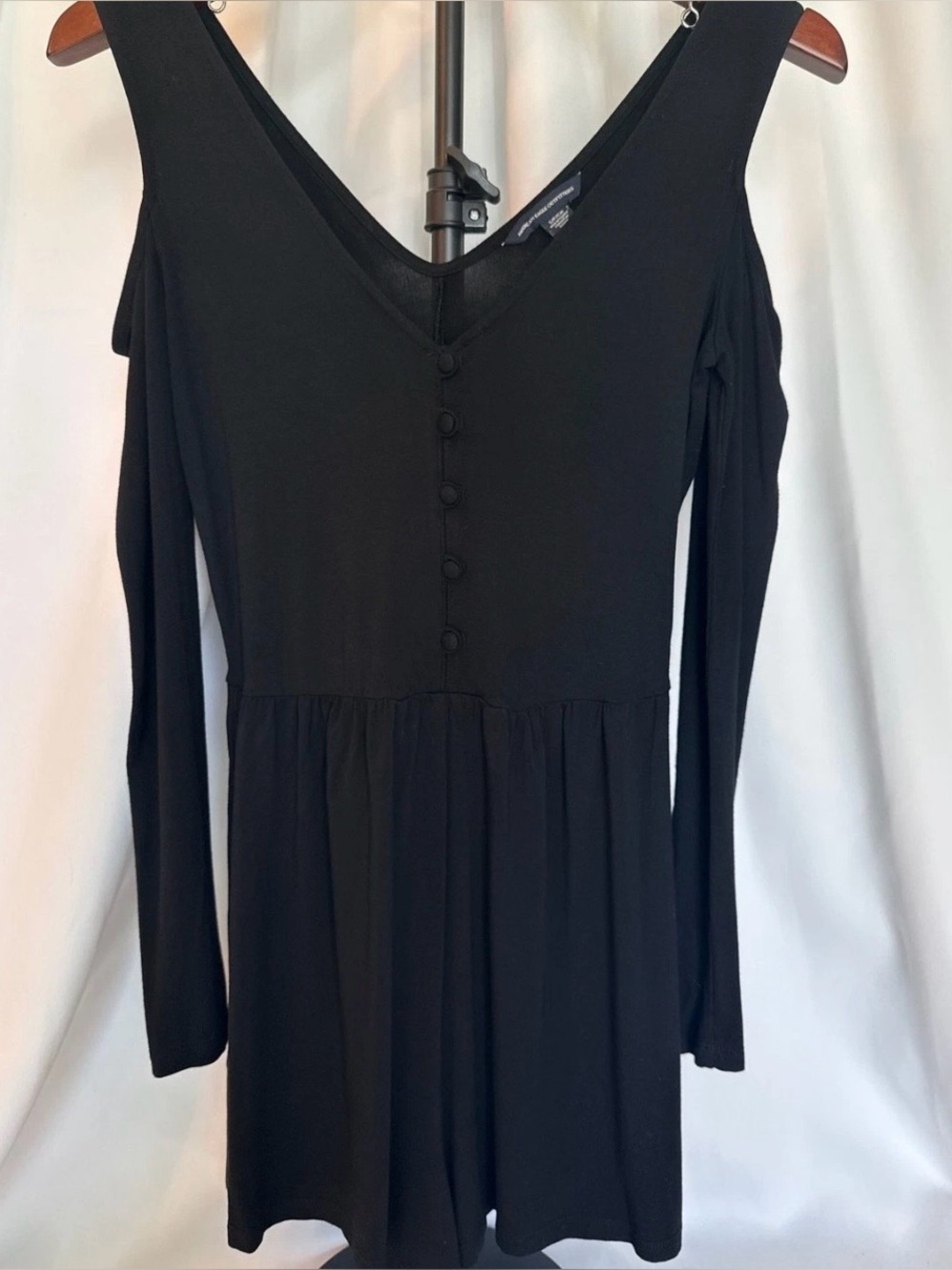 American Eagle black cold shoulder long sleeve shorts romper with button front,